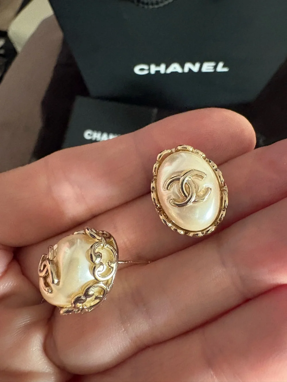 CHANEL Pearl Gold tone  Logo Stud Earrings barely used new condition.